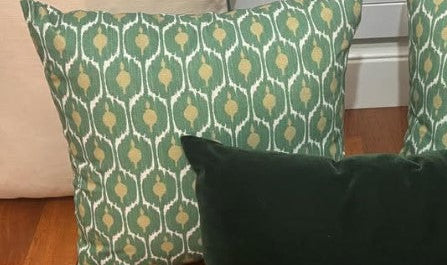 Cojin tela verde ojo